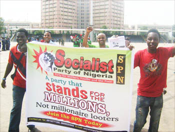 2012 May Day - marching with SPN banner at Abuja rally - photo DSM