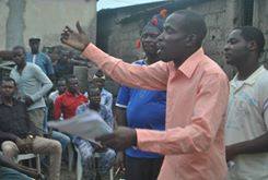 Moshood addressing a mass meeting on police brutality in Ajegunle - photo DSM Moshood addressing a mass meeting on police brutality in Ajegunle - photo DSM
